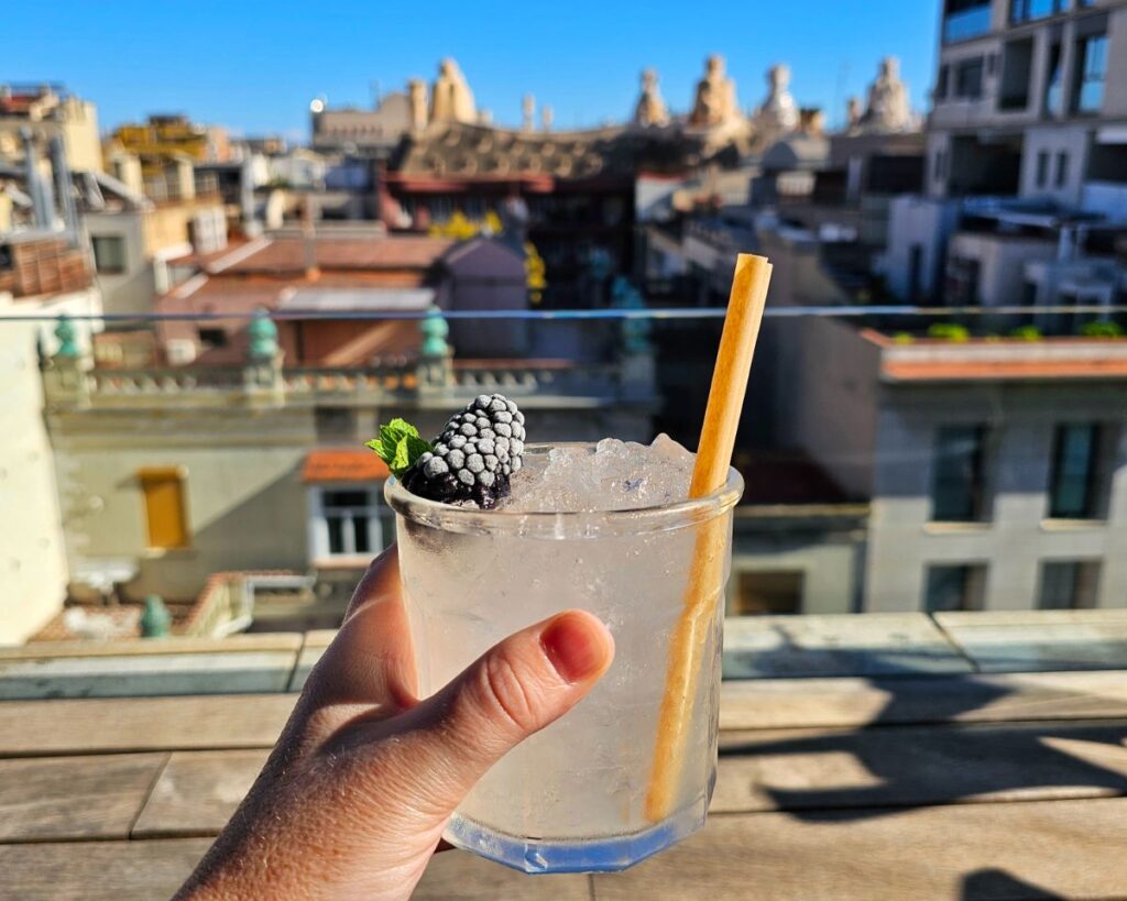 A Cocktail at the one of the best Rooftop Bars in Barcelona with Views of La Pedrera