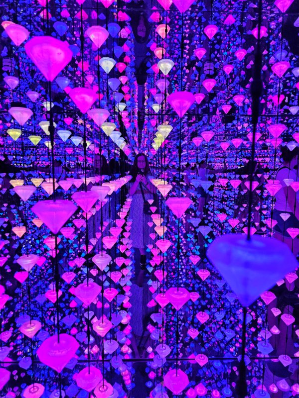 Claire in a colourful exhibition at the Moco Museum