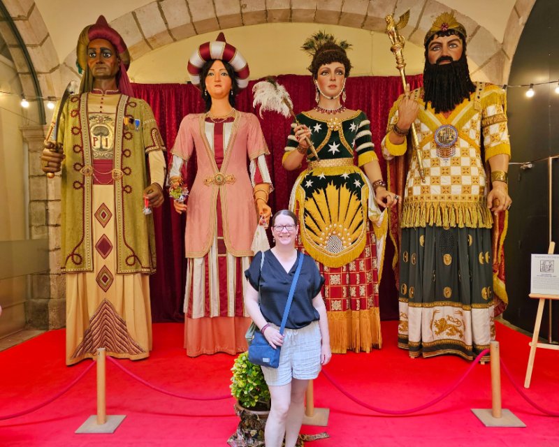Claire Standing in front of some Gegants in Barcelona
