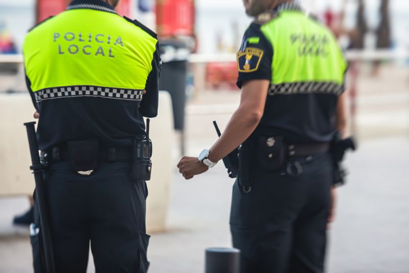 2 Policemen in Barcelona wearing high-vis jackets - Police in Barcelona - Is Barcelona Safe to Visit?