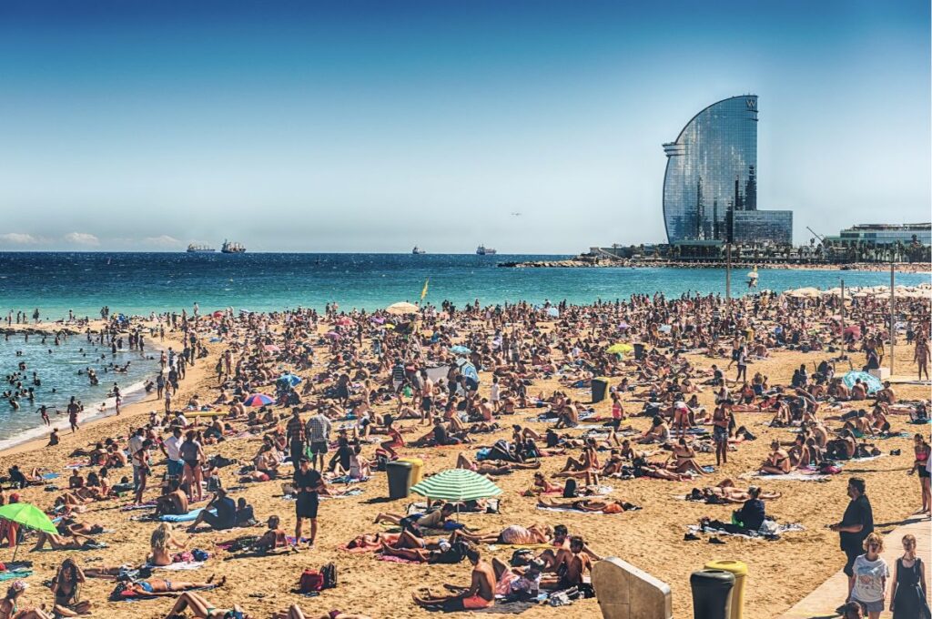 Barceloneta Beach in Barcelona Filled with People - The Worst Time to Visit Barcelona