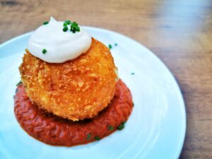 A Bomba - A Popular Tapas Dish Often Featured on Barcelona Food Tours