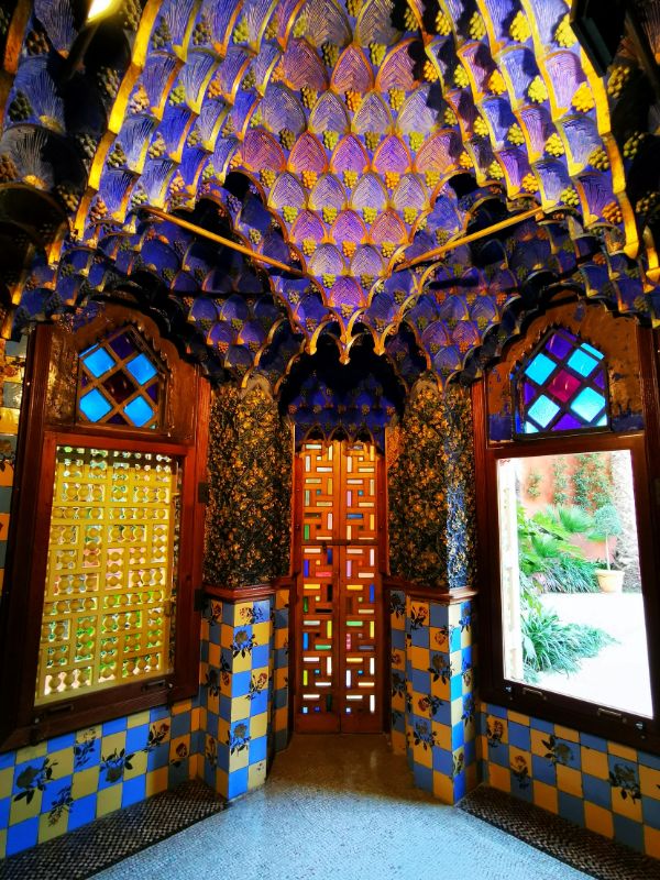 Inside one of the Rooms at Casa Vicens with a blue tiled ceiling