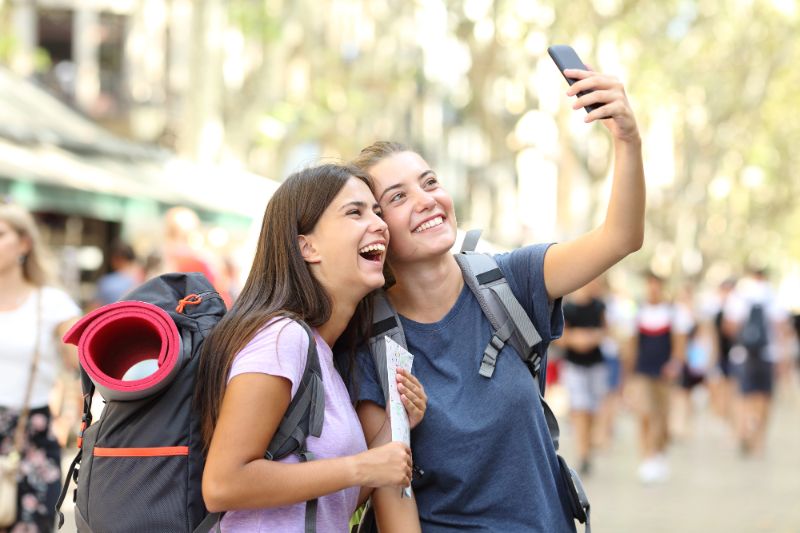 Two friends taking a selfie on La Rambla Barcelona