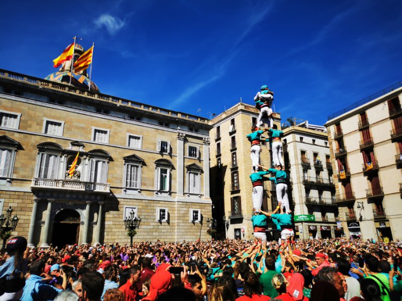 Castellers Performing at La Merce Festival in Barcelona in September - Human Tower in a large square filled with people