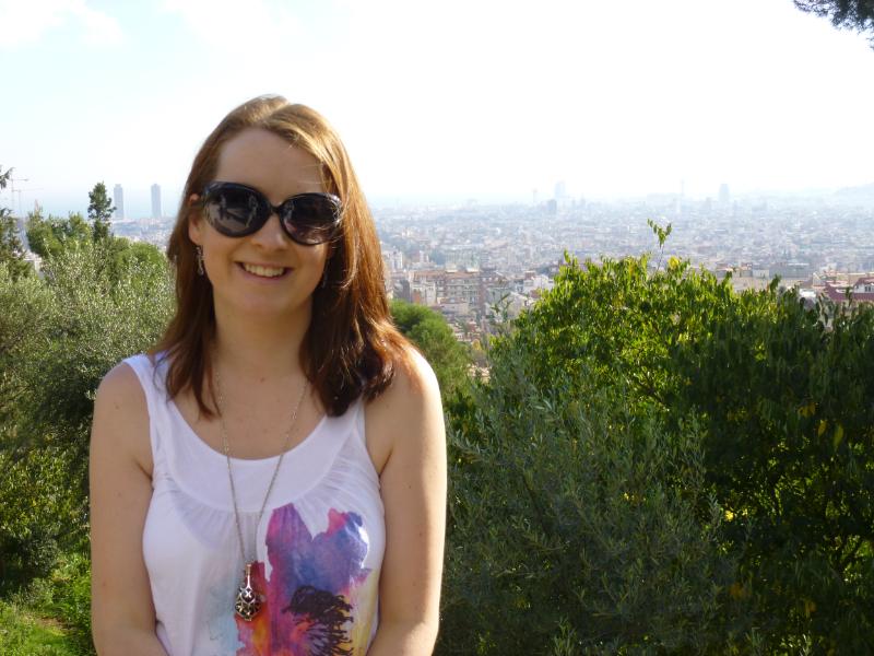 Me (Claire) in Barcelona in 2012 with a view of the city behind me from Park Guell