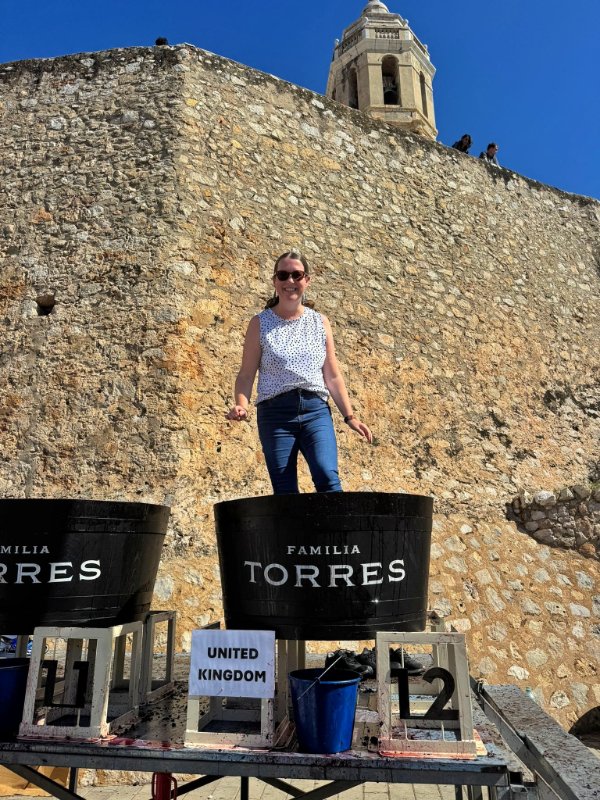 Claire Trying her Foot at Grape Stomping at the Sitges Harvest Festival