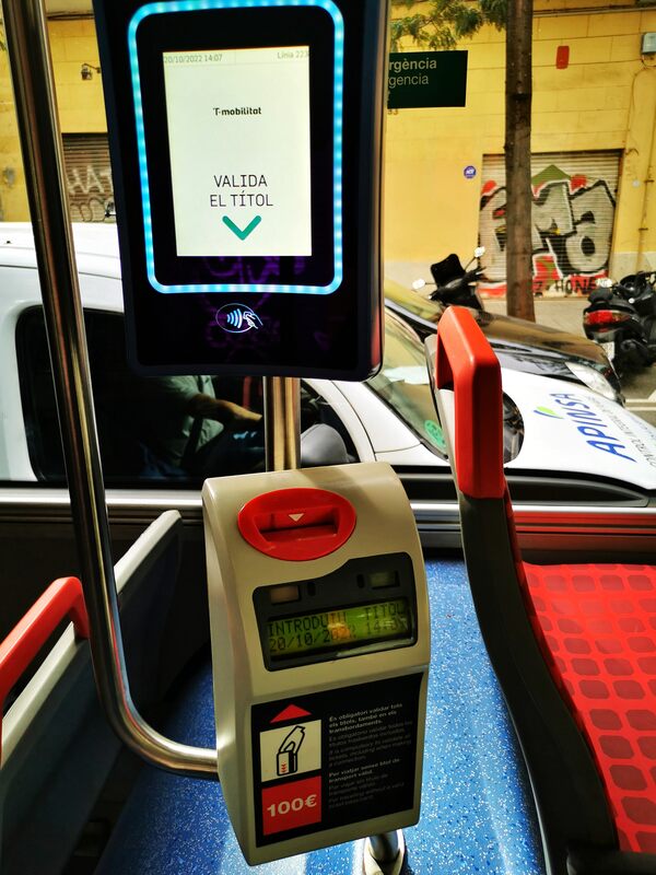 Validate your T-mobilitat card at the ticket machine on the bus