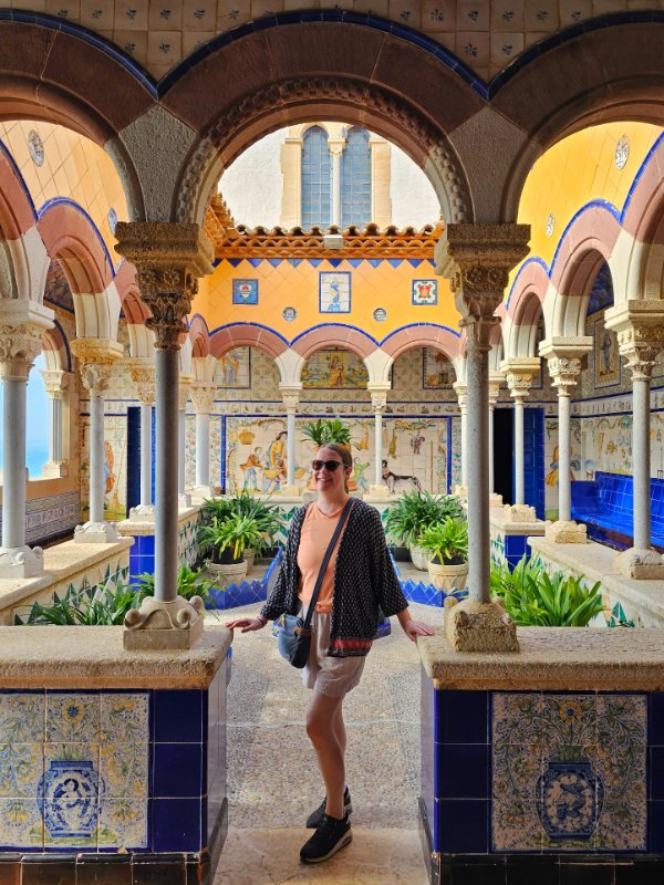 Claire in the Colourful Courtyard at the Palau de Maricel Museum in Sitges