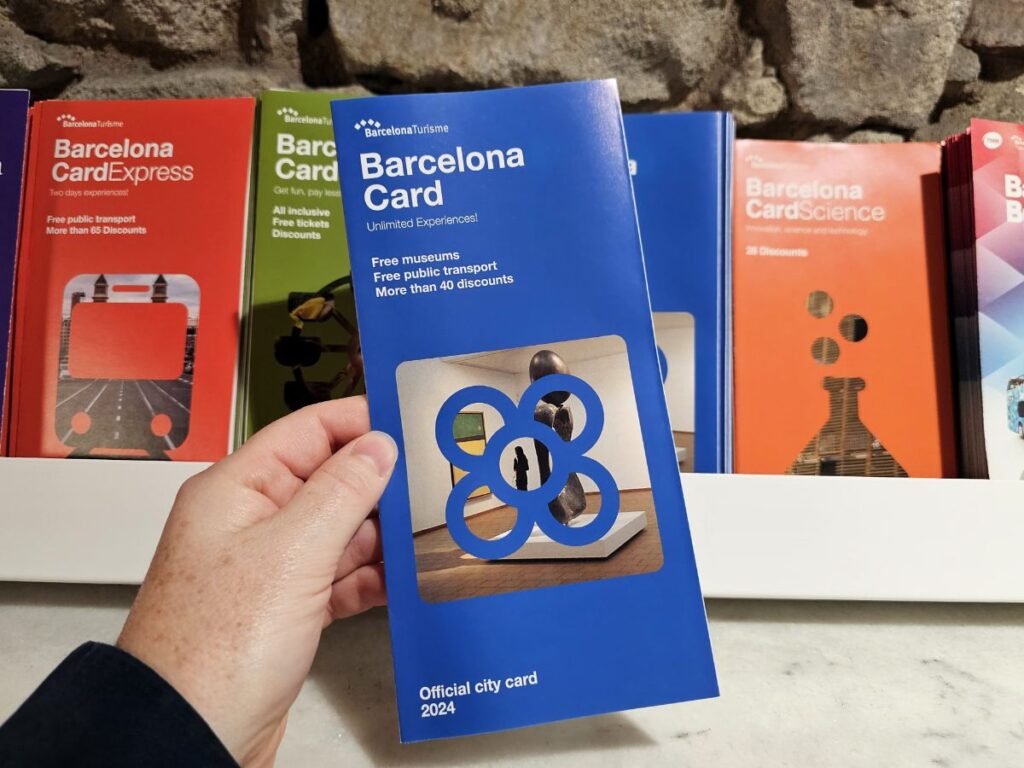 The Barcelona Card - Is the Barcelona Card Worth It? Hand Holding a blue Barcelona Card Flyer