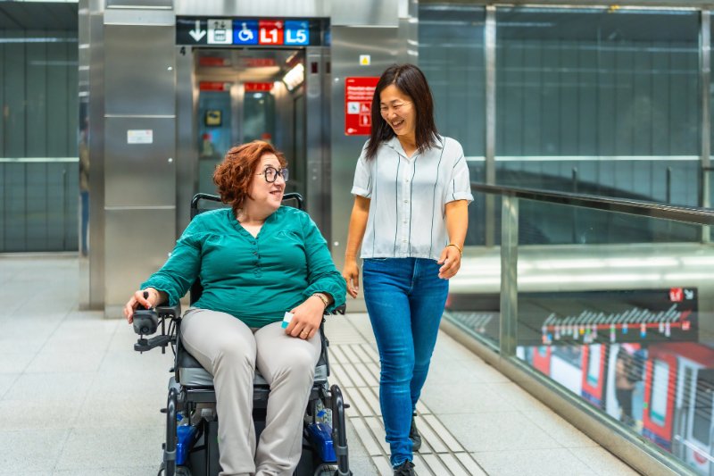 Accessible Barcelona - Woman Visiting Barcelona with a Disability, in a wheelchair at a metro station