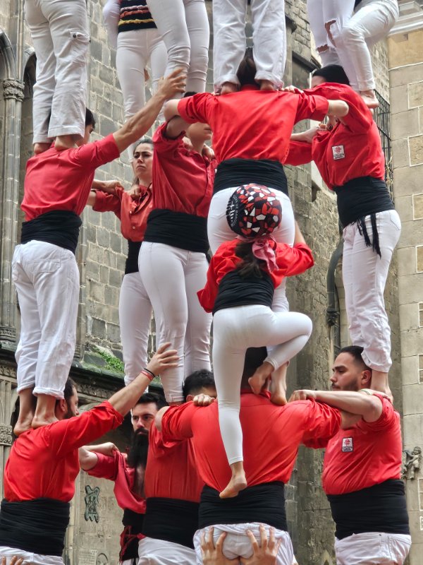 One of the Smallest Castellers de Barcelona Climbs up a Tower